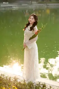 Graceful Ao Dai Vietnamese Beauty Shines Brightly By Serene Lake A Timeless Portrait-10
