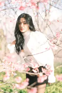 Elegant Beauty Amidst Blooming Cherry Blossoms | A Gentle Girl Evoking Fresh Spring Emotions-0