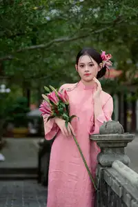Elegant Pink Ao Dai Amidst Ancient Architecture Capturing Timeless Traditional Beauty-8