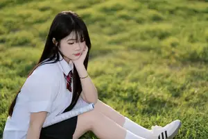 Youthful Schoolgirl in Uniform: Serene Golden Hour Beauty, a Glimpse into Nostalgic Student Life.-10