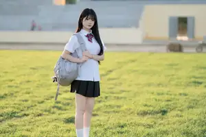 Youthful Schoolgirl in Uniform: Serene Golden Hour Beauty, a Glimpse into Nostalgic Student Life.-6