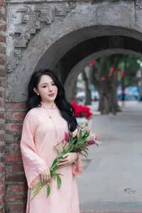 Discover the Elegant Charm of Vietnamese Beauty in a Pink Ao Dai by the Serene Lake-3