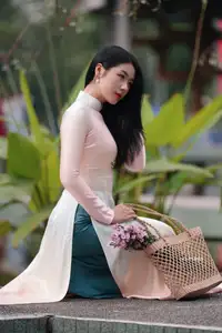 Captivating Grace: Vietnamese Girl in Traditional Ao Dai Beauty 1000025136-15