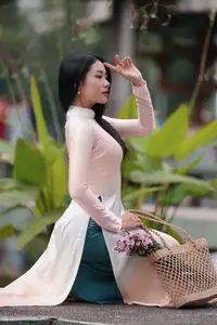 Captivating Grace: Vietnamese Girl in Traditional Ao Dai Beauty 1000025136-5