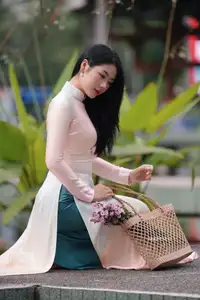 Captivating Grace: Vietnamese Girl in Traditional Ao Dai Beauty 1000025136-14