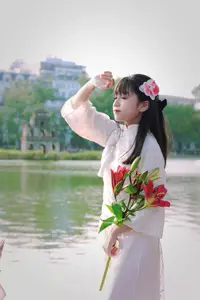 Graceful Vietnamese Girl in White Ao Dai Shines with Traditional Beauty in Old Quarter-7