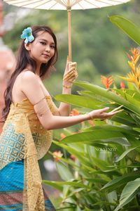Traditional Vietnamese Beauty: Elegant Lady with Golden Lotus-6