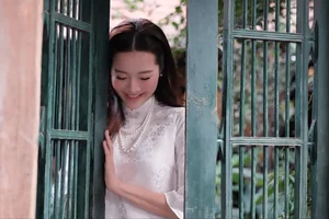 Karen Nguyen radiates timeless elegance in a pure white traditional Ao Dai-1