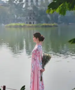 Elegant Asian Beauty: Graceful Woman in Modern Ao Dai by Serene Lakeside-2