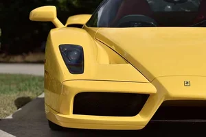 The 16.5 Million Dollar Legend: A Timeless Ferrari Enzo Captured in Radiant Yellow-2
