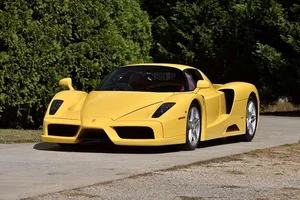 The 16.5 Million Dollar Legend: A Timeless Ferrari Enzo Captured in Radiant Yellow-12