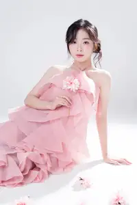 Discover Feminine Elegance: A Girl in a Pink Dress with Pristine Flowers-6