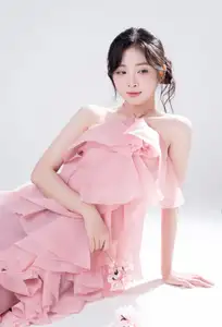 Discover Feminine Elegance: A Girl in a Pink Dress with Pristine Flowers-4