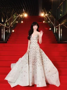 Stunning Red Carpet Elegance: Khả Ngân Shines as a Cinematic Muse in a Breathtaking Evening Gown and High-Fashion Glamour-5