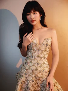 Stunning Red Carpet Elegance: Khả Ngân Shines as a Cinematic Muse in a Breathtaking Evening Gown and High-Fashion Glamour-6