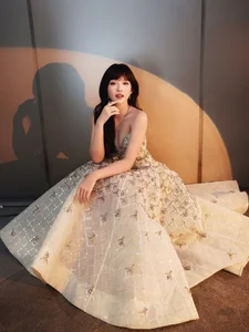 Stunning Red Carpet Elegance: Khả Ngân Shines as a Cinematic Muse in a Breathtaking Evening Gown and High-Fashion Glamour-7