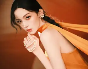 Captivating Beauty: Goddess in a Vibrant Orange Gown, Exuding Elegant Allure.-7