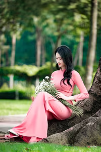 VGU No.18: Captivating Elegance A Young Woman in Pink Ao Dai-0