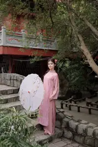 Graceful Pink Ao Dai: Vietnamese Girl showcases traditional beauty on ancient stairs-4