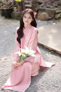 Graceful Pink Ao Dai: Vietnamese Girl showcases traditional beauty on ancient stairs-1