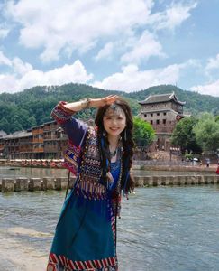 Discover Fenghuang Ancient Town: Serene boat ride, historic riverside charm.-3