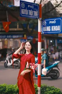 Vietnamese Girl's Bright Smile with Lucky Plush Horses in a Traditional Market.-6