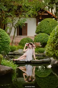 Graceful Young Woman in a Dreamy Garden: A Serene and Elegant Moment 1000025211-10