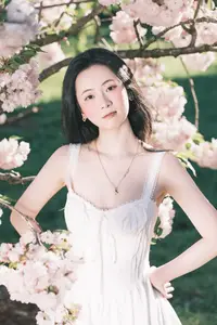 Spring Muse: Pristine Beauty and Grace Amidst Blooming Cherry Blossoms.-3