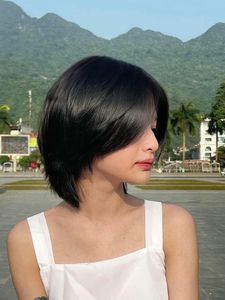 Chic Layered Bob Haircut for Round Faces - Trendy Short Hair for Beautiful Women-5