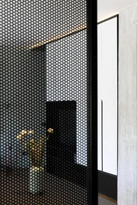 Milanese Minimalism: A Sun-Drenched 60m2 Apartment Redefined by Light and Iron Frames-18