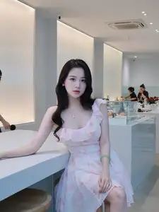 Gentle Charm: Beautiful Girl in Pink Floral Dress, Captivating Elegant Style.-7