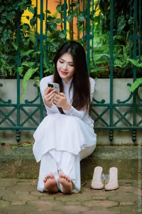 VGU No.87: Discover the captivating elegance of a Vietnamese girl in a pristine white Ao Dai.-2