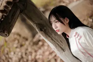 Timeless Elegance: Vietnamese Woman in Traditional Ao Dai Amidst Serene Backdrop-9