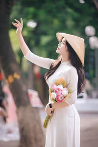 XVG No.45: Captivating Grace: Vietnamese Girl in White Ao Dai, Embracing Youthful Elegance-6