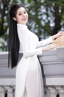 Vietnamese Beauty: Elegant Traditional White Ao Dai Woman with Conical Hat-8