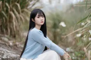 Explore Serene Beauty: Long-Haired Girl Immersed in Music Amidst Pampas Grass-2