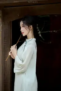 Vietnamese Grace: Elegant Portrait of a Young Woman in Lush Nature-5