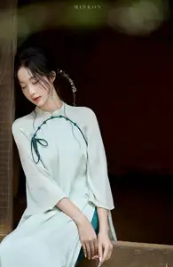 Vietnamese Grace: Elegant Portrait of a Young Woman in Lush Nature-3