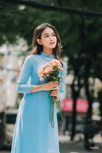 Elegant Pastel Blue Ao Dai in the Heart of the City-1