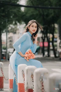 Elegant Pastel Blue Ao Dai in the Heart of the City-3