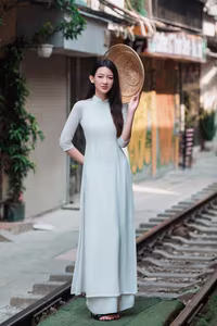 VGU No.79: Elegant Vietnamese Ao Dai Beauty on Hanoi Train Street-1