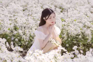 Ethereal Beauty: Young Woman in White Dress with Bouquet Amidst Dreamy Clouds-6