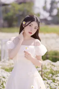 Ethereal Beauty: Young Woman in White Dress with Bouquet Amidst Dreamy Clouds-3