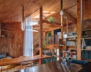 Modern Japanese Architecture: Kazari Garden House in Tokyo Featuring a Unique Curved Terrace and Light-Filled Minimalist Split-Level Interiors-6