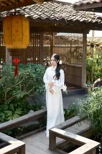 Elegant White Ao Dai: Pure Beauty of Vietnamese Woman with Pristine Orchids.-13