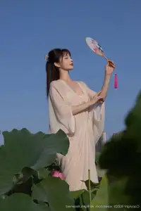Discover Lu Xuan Xuan's Graceful Beauty in a White Dress Amidst a Serene Lotus Pond - XiuRen No.10630-12