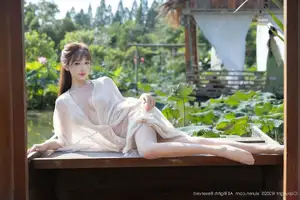 Discover Lu Xuan Xuan's Graceful Beauty in a White Dress Amidst a Serene Lotus Pond - XiuRen No.10630-17