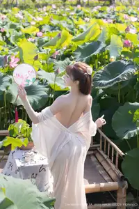 Discover Lu Xuan Xuan's Graceful Beauty in a White Dress Amidst a Serene Lotus Pond - XiuRen No.10630-41