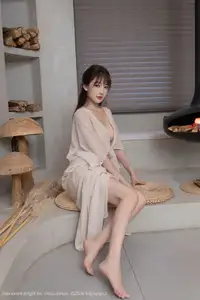 Discover Lu Xuan Xuan's Graceful Beauty in a White Dress Amidst a Serene Lotus Pond - XiuRen No.10630-23