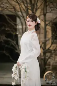 Elegant Asian Beauty: A Gentle Girl Adorned with a Pure White Orchid-1